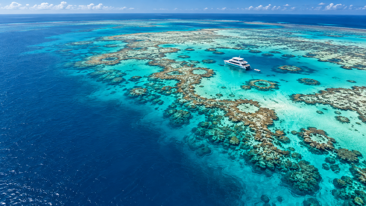Coral reefs in turquoise water on the Great Barrier Reef off Cairns
