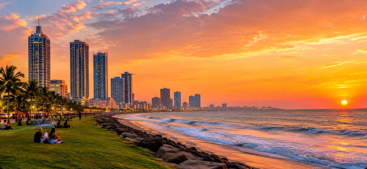 Galle Face Green at sunset with the Colombo skyline behind