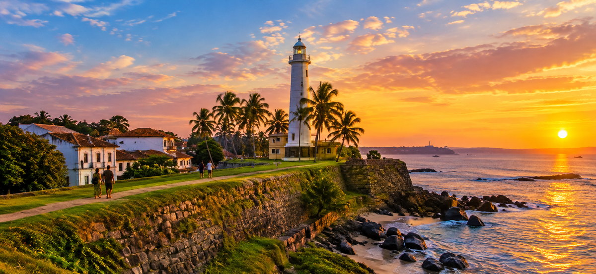 The ramparts and lighthouse of Galle Fort at sunset