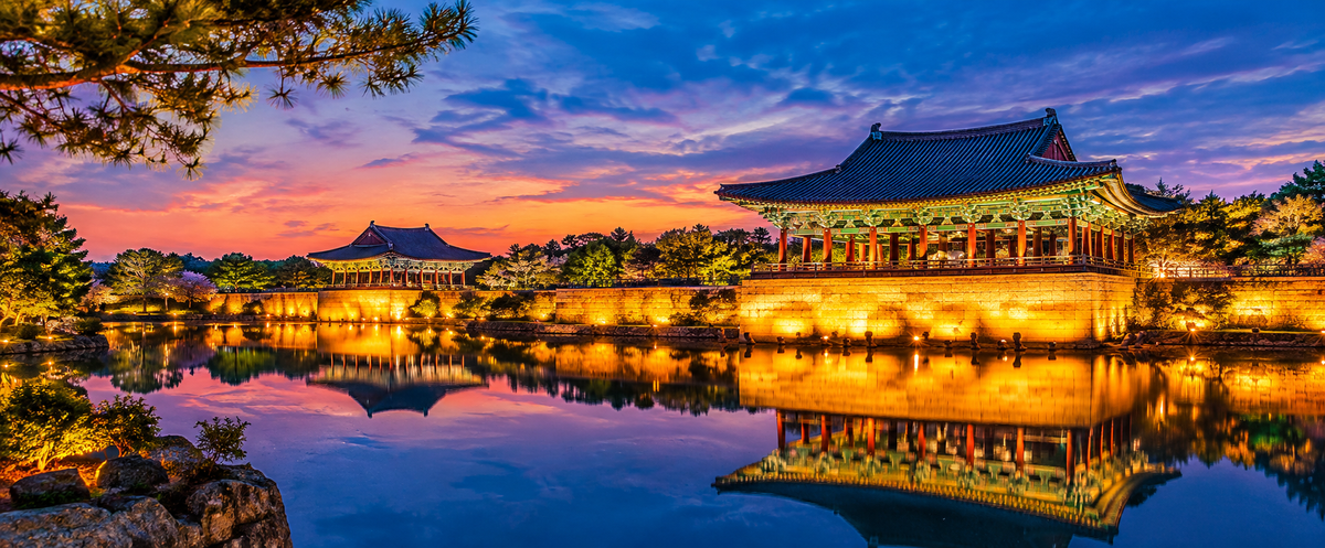 Donggung Palace pavilions reflected in Wolji Pond at night, Gyeongju