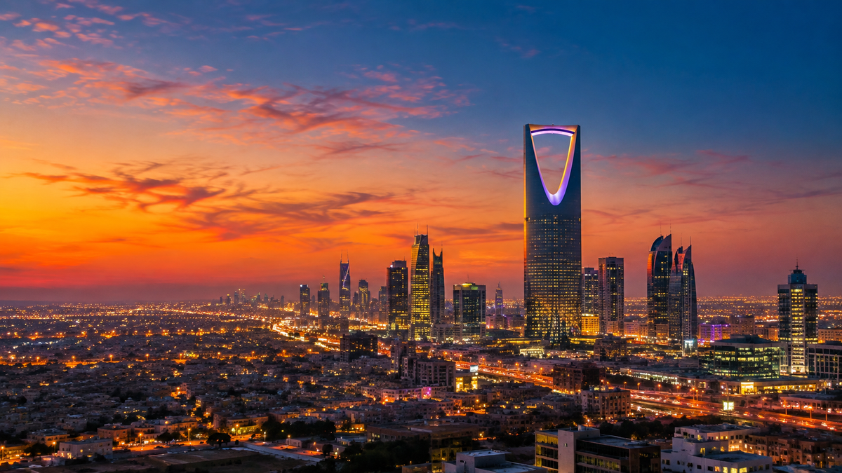 The Riyadh skyline at dusk, with the Kingdom Centre and its Sky Bridge arch